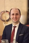 Muzaffer C.