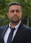 Tolga E.